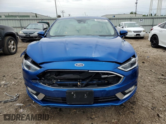 2017 Ford Fusion Hybrid Titanium with VIN 3FA6P0RU1HR138725, listed as a Copart auction lot 56650625 with 77,331 mi miles and Salvage title. Bid and sale history available at DreamBid. Image 5.