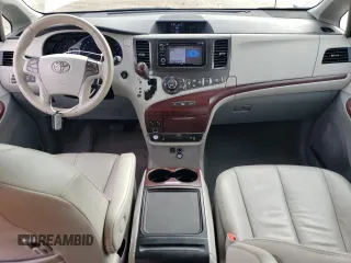 2012 Toyota Sienna XLE AAS with VIN 5TDYK3DC0CS250830, listed as a Copart auction lot 73323284 with 147,580 mi miles and Salvage Title. Bid and sale history available at DreamBid. Image 8.