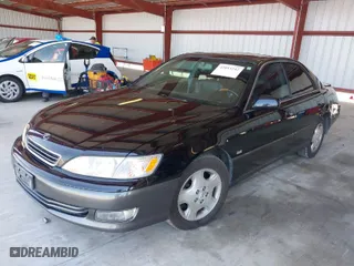 2000 Lexus ES 300 with VIN JT8BF28G3Y5094800, listed as a IAAI auction lot 42053242 with 147,169 mi miles. Bid and sale history available at carsss.com. Image 2.