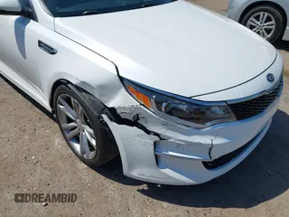 2016 Kia Optima LX with VIN KNAGT4L32G5085128, listed as a IAAI auction lot 42016728 with 259,218 mi miles. Bid and sale history available at carsss.com. Image 6.