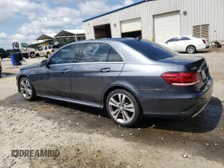 2014 Mercedes-Benz E 350 Sport with VIN WDDHF5KB7EB038257, listed as a Copart auction lot 61251595 with 110,814 mi miles and Salvage title. Bid and sale history available at DreamBid. Image 2.