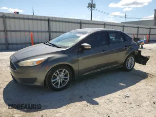 2015 Ford Focus SE with VIN 1FADP3F26FL336529, listed as a Copart auction lot 53676355 with 145,008 mi miles and Salvage Title. Bid and sale history available at DreamBid. Image 1.