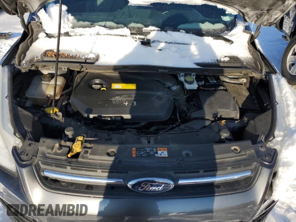 2016 Ford Escape SE z VIN 1FMCU0GX7GUA21205, wystawiony jako Copart lot #87261424 z przebiegiem 112 305 mil mil oraz Szkoda całkowita • Salvage title. Historia ofert i sprzedaży dostępna na DreamBid. Obrazek 11.