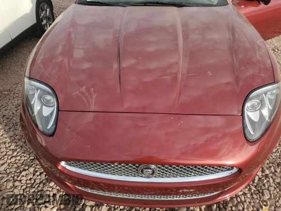 2013 Jaguar XK with VIN SAJWA4GB0DLB50530, listed as a Copart auction lot 82715724 with 24,634 mi miles and Salvage Title. Bid and sale history available at carsss.com. Image 11.