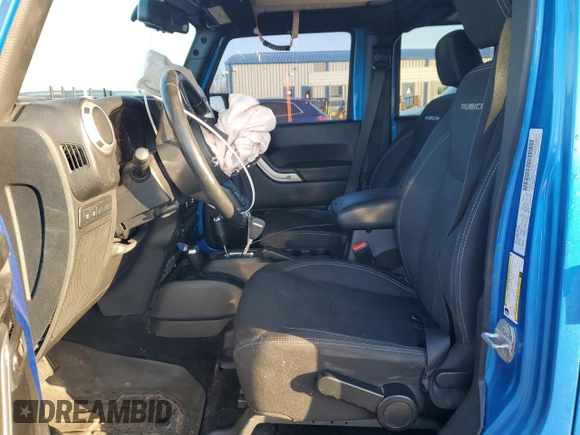 2015 Jeep Wrangler Unlimited Rubicon with VIN 1C4BJWFGXFL772056, listed as a Copart auction lot 48470425 with 106,367 mi miles and Salvage Title. Bid and sale history available at carsss.com. Image 7.