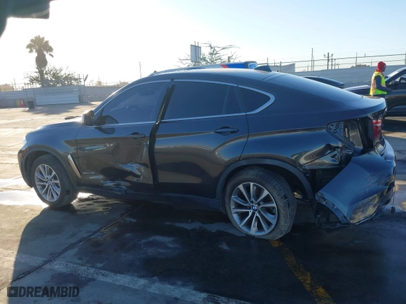 2019 BMW X6 sDrive35i with VIN 5UXKU0C57K0S97581, listed as a IAAI auction lot 41322568 with 76,635 mi miles. Bid and sale history available at carsss.com. Image 14.