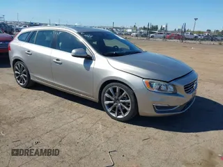 2015 Volvo V60 T5 Drive-E Premier with VIN YV126MEB5F1204749, listed as a IAAI auction lot 41866383 with 115,164 mi miles. Bid and sale history available at carsss.com. Image 1.