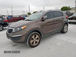 2012 Kia Sportage LX z VIN KNDPB3A24C7312795, wystawiony jako Copart lot #58910985 z przebiegiem 97 707 mil mil oraz Szkoda całkowita • Salvage title. Historia ofert i sprzedaży dostępna na DreamBid. Obrazek 1.