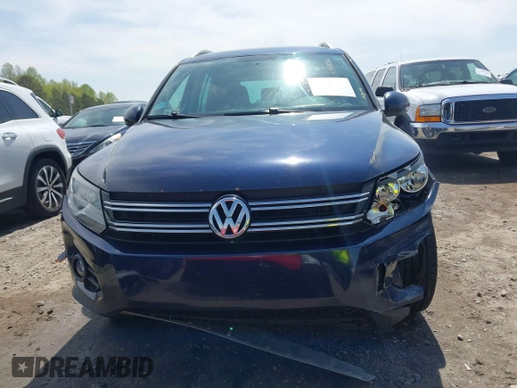 2012 Volkswagen Tiguan S with VIN WVGBV7AX3CW571039, listed as a IAAI auction lot 41928361 with 165,938 mi miles and . Bid and sale history available at DreamBid. Image 12.