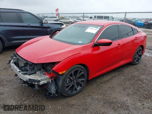2019 Honda Civic Sedan Sport with VIN 2HGFC2F83KH540209, listed as a IAAI auction lot 41601755 with 54,177 mi miles. Bid and sale history available at carsss.com. Image 2.