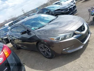 2016 Nissan Maxima SV with VIN 1N4AA6AP0GC904168, listed as a IAAI auction lot 41865822 with 121,999 mi miles and . Bid and sale history available at DreamBid. Image 13.