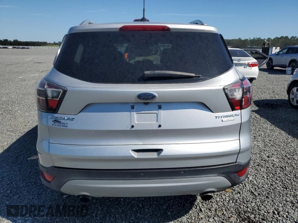 2017 Ford Escape Titanium with VIN 1FMCU0J90HUB04082, listed as a Copart auction lot 77814994 with 135,674 mi miles and Salvage Title. Bid and sale history available at carsss.com. Image 6.
