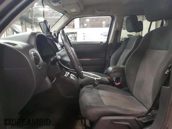 2016 Jeep Patriot High Altitude with VIN 1C4NJRFB5GD697474, listed as a Copart auction lot 57881215 with 152,127 mi miles and Salvage title. Bid and sale history available at DreamBid. Image 7.