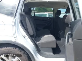 2018 Volkswagen Tiguan S with VIN 3VV1B7AX0JM092116, listed as a IAAI auction lot 42388339 with 103,412 mi miles and . Bid and sale history available at DreamBid. Image 8.