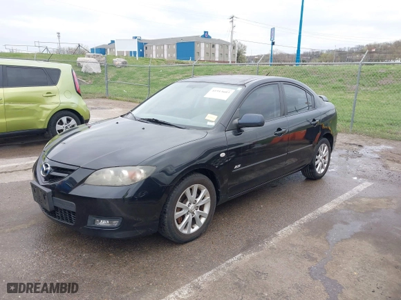 2007 Mazda Mazda3 s Touring with VIN JM1BK323571640804, listed as a IAAI auction lot 41913603 with 134,147 mi miles. Bid and sale history available at carsss.com. Image 2.