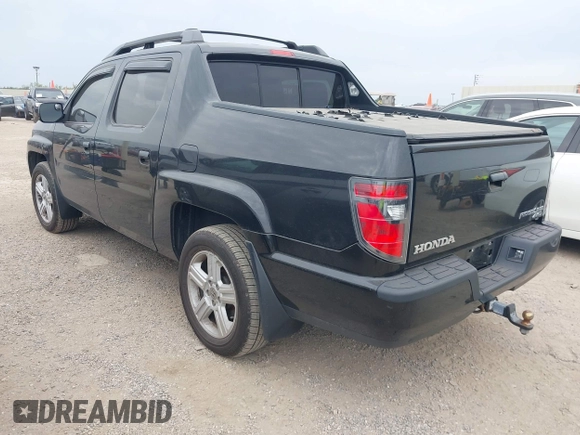 2013 Honda Ridgeline RTL with VIN 5FPYK1F56DB003473, listed as a IAAI auction lot 42101963 with 170,375 mi miles and . Bid and sale history available at DreamBid. Image 3.