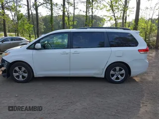 2011 Toyota Sienna LE AAS with VIN 5TDKK3DC5BS074247, listed as a IAAI auction lot 42096751 with 241,555 mi miles. Bid and sale history available at carsss.com. Image 14.