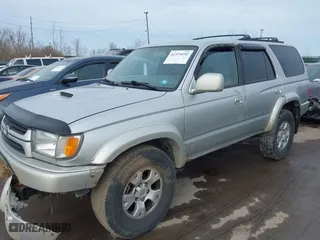 2001 Toyota 4Runner SR5 with VIN JT3GN86R210191592, listed as a IAAI auction lot 41574192 with 217,702 mi miles. Bid and sale history available at carsss.com. Image 2.