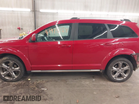 2016 Dodge Journey Crossroad Plus z VIN 3C4PDDGGXGT245673, wystawiony jako IAAI lot #41915165 z przebiegiem 124 861 mil mil oraz . Historia ofert i sprzedaży dostępna na DreamBid. Obrazek 15.