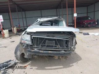 2014 Chevrolet Tahoe LT with VIN 1GNSKBE02ER147079, listed as a IAAI auction lot 42204312 with Not provided miles and . Bid and sale history available at DreamBid. Image 13.