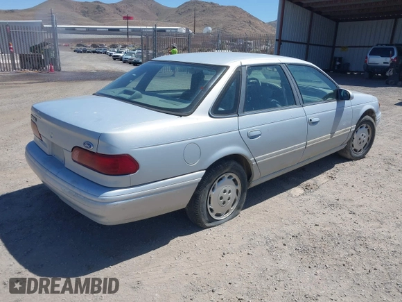 1994 Ford Taurus GL z VIN 1FALP52U2RG186625, wystawiony jako IAAI lot #42381964 z przebiegiem 54 020 mil mil oraz . Historia ofert i sprzedaży dostępna na DreamBid. Obrazek 4.