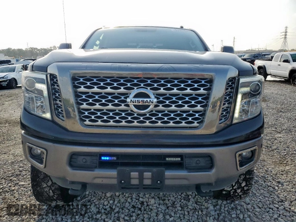 2017 Nissan Titan Platinum Reserve with VIN 1N6BA1F43HN568650, listed as a Copart auction lot 59593525 with 126,193 mi miles and Salvage title. Bid and sale history available at DreamBid. Image 5.