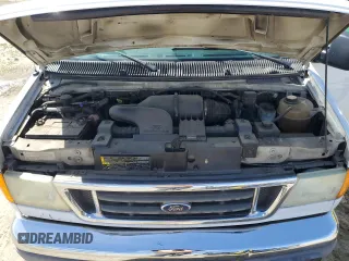 2005 Ford Econoline Passenger XL with VIN 1FBNE31L55HA93452, listed as a Copart auction lot 51860995 with 237,049 mi miles and Clean Title. Bid and sale history available at carsss.com. Image 12.