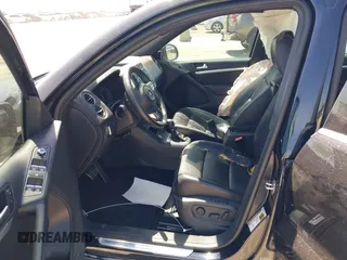 2014 Volkswagen Tiguan SEL with VIN WVGAV3AX4EW025339, listed as a IAAI auction lot 42313665 with 96,756 mi miles and . Bid and sale history available at DreamBid. Image 5.