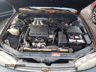 1994 Toyota Camry XLE with VIN JT2GK13E2R0008225, listed as a Copart auction lot 83668084 with 258,735 mi miles and Salvage Title. Bid and sale history available at carsss.com. Image 11.