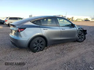 2024 Tesla Model Y Long Range z VIN 7SAYGAEEXRF211507, wystawiony jako Copart lot #56432715 z przebiegiem Nie podano mil oraz Szkoda całkowita • Salvage title. Historia ofert i sprzedaży dostępna na DreamBid. Obrazek 3.