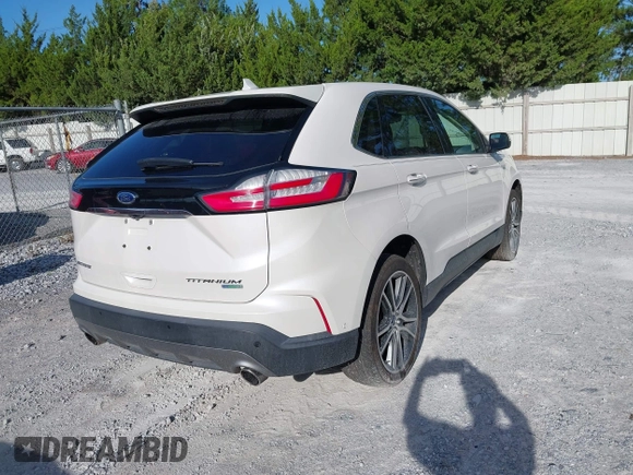 2019 Ford Edge Titanium with VIN 2FMPK3K95KBB34764, listed as a IAAI auction lot 42719541 with 128,028 mi miles and . Bid and sale history available at DreamBid. Image 4.