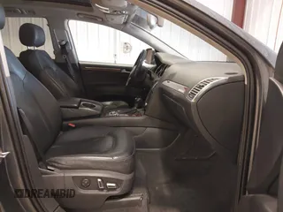 2014 Audi Q7 3.0T Premium Plus with VIN WA1LGAFE7ED004302, listed as a IAAI auction lot 41793547 with 157,351 mi miles. Bid and sale history available at carsss.com. Image 5.