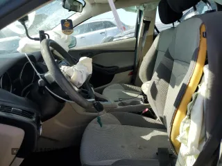 2012 Ford Focus SE with VIN 1FAHP3F24CL163896, listed as a Copart auction lot 61651015 with Not provided miles and Salvage title. Bid and sale history available at DreamBid. Image 7.