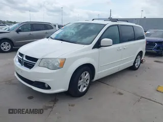 2011 Dodge Grand Caravan Crew with VIN 2D4RN5DGXBR786592, listed as a IAAI auction lot 42114198 with 243,423 mi miles and . Bid and sale history available at DreamBid. Image 2.
