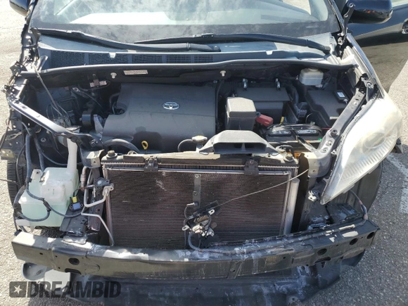 2015 Toyota Sienna LE AAS with VIN 5TDKK3DC8FS610940, listed as a Copart auction lot 47390285 with 128,893 mi miles and Salvage Title. Bid and sale history available at carsss.com. Image 14.