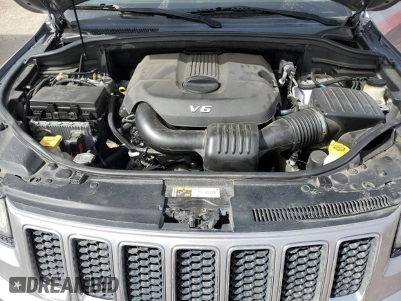 2014 Jeep Grand Cherokee Overland with VIN 1C4RJFCG4EC326325, listed as a Copart auction lot 49166645 with 128,261 mi miles and Salvage Title. Bid and sale history available at DreamBid. Image 12.