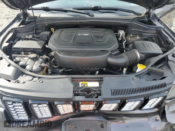 2017 Jeep Grand Cherokee Altitude z VIN 1C4RJFAG9HC720250, wystawiony jako Copart lot #56956155 z przebiegiem 138 879 mil mil oraz Szkoda całkowita • Salvage title. Historia ofert i sprzedaży dostępna na DreamBid. Obrazek 12.