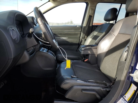 2014 Jeep Compass High Altitude with VIN 1C4NJCEA9ED678722, listed as a Copart auction lot 86573694 with 234,985 mi miles and Clean Title. Bid and sale history available at carsss.com. Image 7.