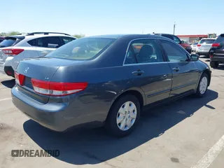 2004 Honda Accord LX with VIN 1HGCM56324A147017, listed as a IAAI auction lot 42582327 with 165,823 mi miles and . Bid and sale history available at DreamBid. Image 4.
