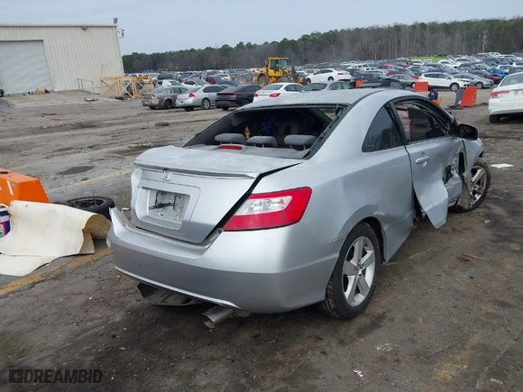 2008 Honda Civic Cpe EX-L with VIN 2HGFG12938H546744, listed as a IAAI auction lot 41526059 with 232,981 mi miles. Bid and sale history available at carsss.com. Image 4.