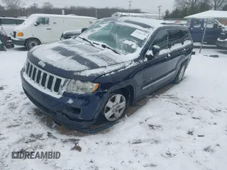 2013 Jeep Grand Cherokee Laredo with VIN 1C4RJFAGXDC542987, listed as a IAAI auction lot 41262770 with 199,273 mi miles. Bid and sale history available at carsss.com. Image 17.