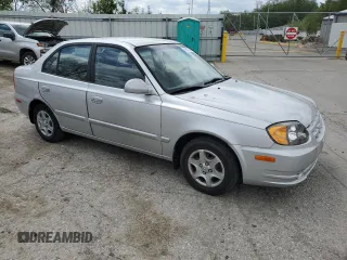 2004 Hyundai Accent GL with VIN KMHCG45C94U515186, listed as a Copart auction lot 52697284 with 49,236 mi miles and Salvage Title. Bid and sale history available at carsss.com. Image 4.