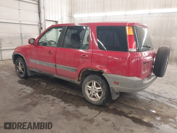 2000 Honda CR-V EX with VIN JHLRD1861YC009880, listed as a IAAI auction lot 41613882 with 238,499 mi miles. Bid and sale history available at carsss.com. Image 3.