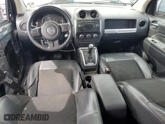 2014 Jeep Compass Latitude with VIN 1C4NJDEB4ED788348, listed as a Copart auction lot 52885935 with 86,282 mi miles and Salvage Title. Bid and sale history available at DreamBid. Image 8.