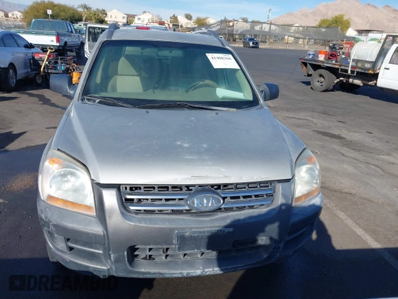 2005 Kia Sportage LX with VIN KNDJE723957066325, listed as a IAAI auction lot 41408266 with 225,570 mi miles and . Bid and sale history available at carsss.com. Image 6.