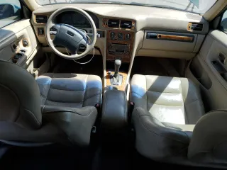 1998 Volvo S70 T5 z VIN YV1LS5372W2476397, wystawiony jako Copart lot #52776114 z przebiegiem 262 041 mil mil oraz Szkody całkowita. Historia ofert i sprzedaży dostępna na DreamBid. Obrazek 8.