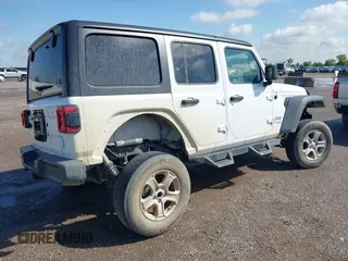 2020 Jeep Wrangler Unlimited Sport with VIN 1C4HJXDM2LW262867, listed as a IAAI auction lot 42303520 with 56,461 mi miles and . Bid and sale history available at DreamBid. Image 4.
