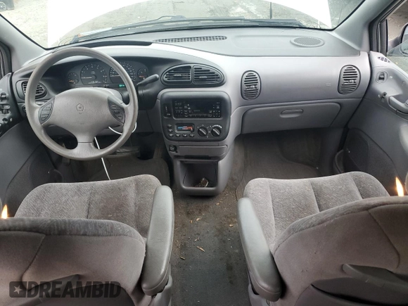 1999 Plymouth Voyager Grand SE z VIN 1P4GP44G7XB831207, wystawiony jako Copart lot #79558714 z przebiegiem 163 620 mil mil oraz Szkody całkowita. Historia ofert i sprzedaży dostępna na DreamBid. Obrazek 8.
