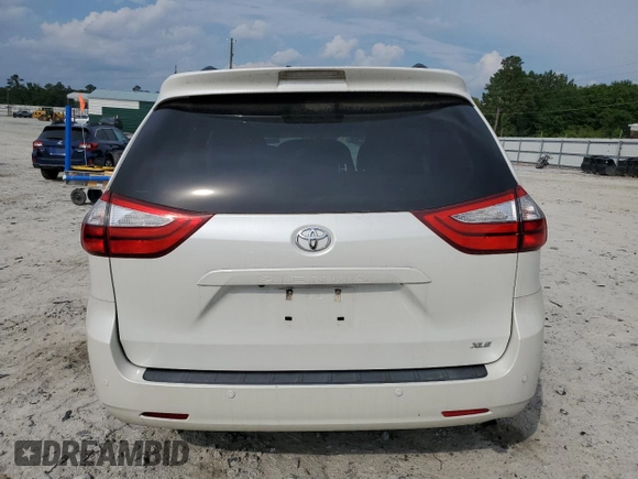 2016 Toyota Sienna XLE with VIN 5TDYK3DC3GS730639, listed as a Copart auction lot 57379935 with 105,323 mi miles and Salvage title. Bid and sale history available at DreamBid. Image 6.