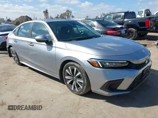 2022 Honda Civic Sedan EX with VIN 2HGFE1F79NH327295, listed as a IAAI auction lot 41718620 with 26,624 mi miles. Bid and sale history available at carsss.com. Image 1.